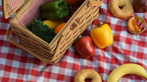 Picnic, basket and tablecloth.  UHD. Stock Footage 87411324