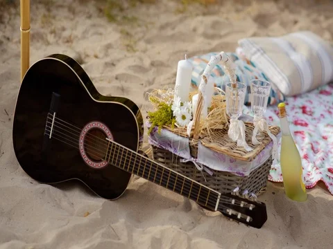 Picnic on the beach at sunset 動画素材 74123682