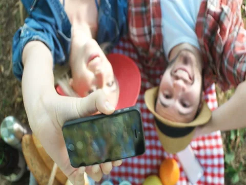 Picnic concept with vegetarian couple in park outdoor Stock Footage 59188378