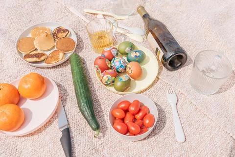Picnic in nature Easter celebration with painted colored traditional eggs, fr Stock Photos