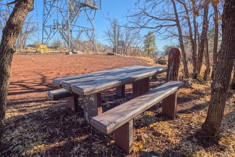 Picnic Table beneath Apache Maid Mountain Fire Tower Stock Photos