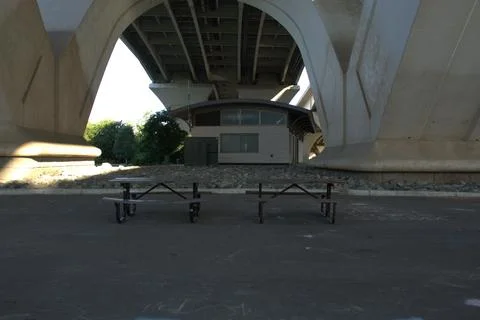 Picnic Table Beneath Large Concrete Highway Bridge Structure Stock Photos