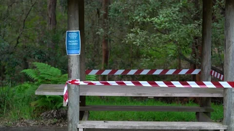 Picnic table is closed due to covid-19 restrictions. Stock Footage 133617316