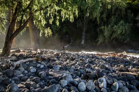 Picnic table under an overpass in a small oceanfront park in Kona. Photos
