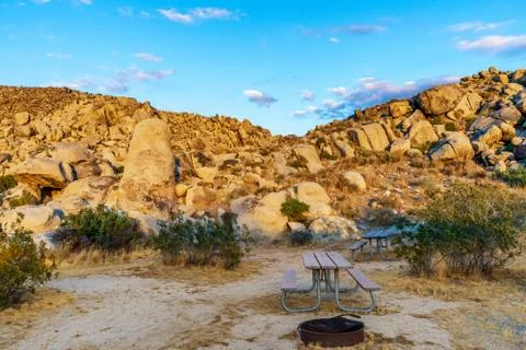 Picnic tables and fire ring in the Mojave Desert in Calaifornia. Stock Photos
