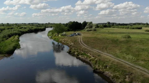 Picnic with tents by the river Video stock 147663788
