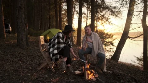 Picnic for two on the river bank Stock Footage 154340784