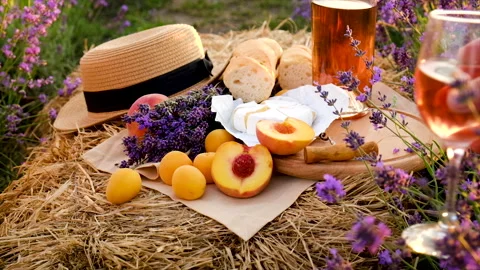 Picnic wine in a lavender field. Selective focus. Stock Footage 158614451