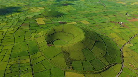 Pico Dona Joana Surrounded By A Patchwork Of Lush Green Farm Fields Separated Video stock 337206184