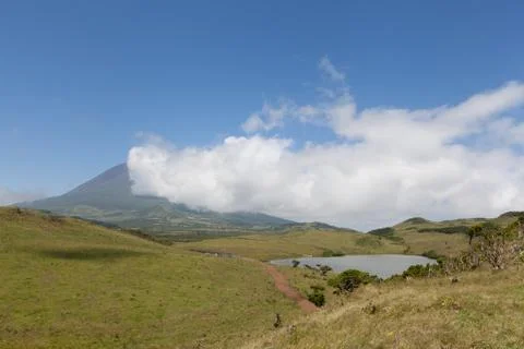 Pico Mountain with clouds Stock Photos