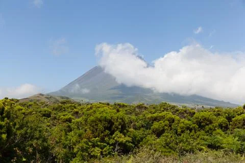 Pico Mountain with clouds Stock Photos
