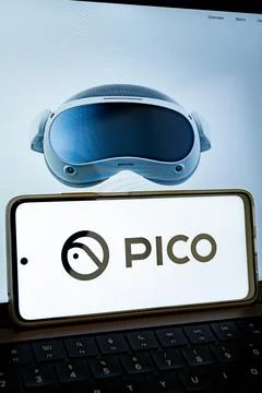 Pico virtual reality headset, smartphone showing company logo Stock Photos