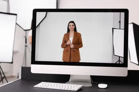 Picture of beautiful model on computer screen in professional photo studio 스톡 사진