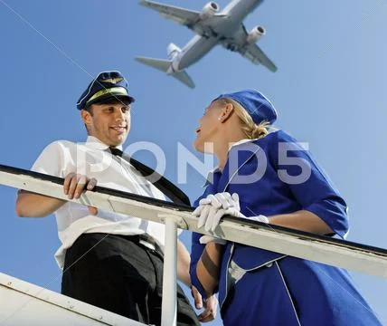 Picture of a cabin crew couple Stock Photos