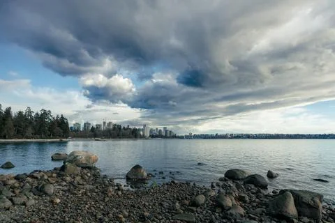 A picture captures the sight of stormy clouds looming over English Bay, whi.. Stock Photos