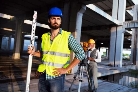 Picture of construction engineer working on building site Stock Photos
