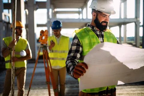 Picture of construction engineer working on building site Stock Photos
