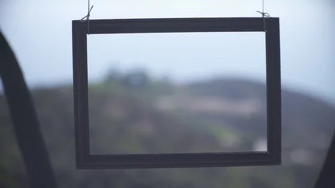 Picture frame on the mountain landscape Stock Footage 98654729
