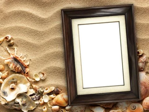 Picture frame on shells and sand background Stockfoto's