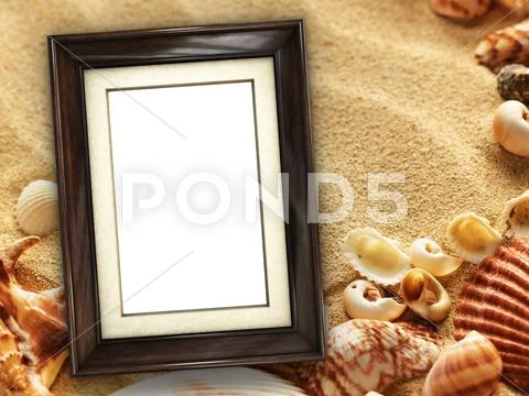 Picture frame on shells and sand background Stock Photos