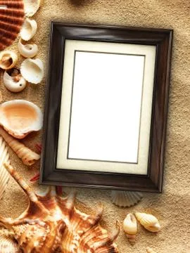 Picture frame on shells and sand background 스톡 사진