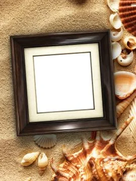 Picture frame on shells and sand background Foto stock