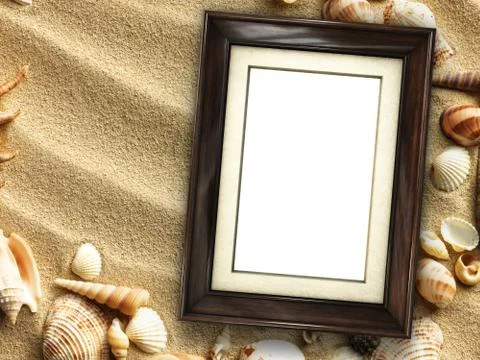 Picture frame on shells and sand background Stock Photos