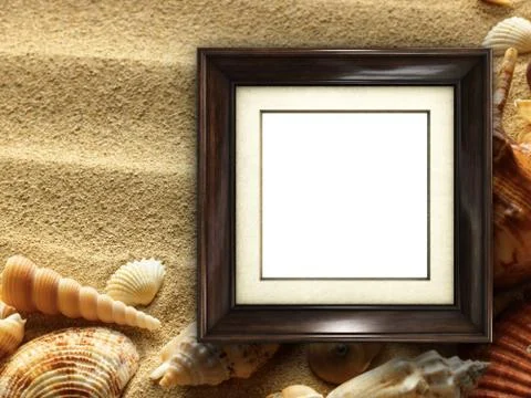 Picture frame on shells and sand background 写真素材
