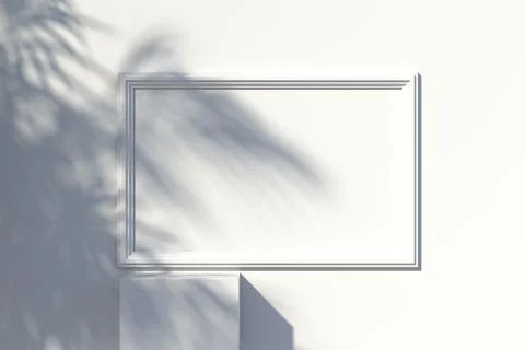 Picture frame on the wall and a falling shadow from a tree on it. 3d renderin Stock Photos