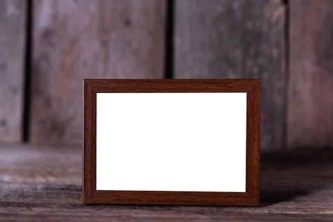 Picture frame on wood table Stock Photos