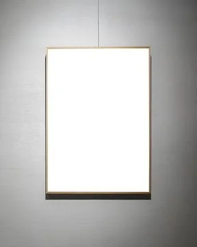 Picture frames with copy space for text hanging on the wall with wallpaper... Stockfoto's