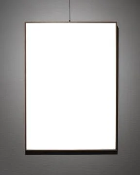 Picture frames with copy space for text hanging on the wall with wallpaper... 写真素材