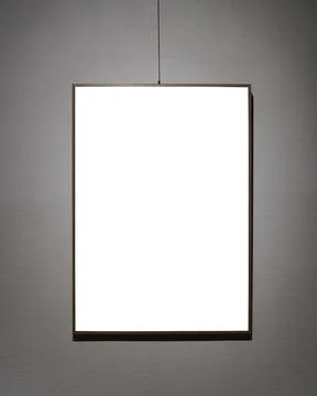 Picture frames with copy space for text hanging on the wall with wallpaper... Stockfoto's