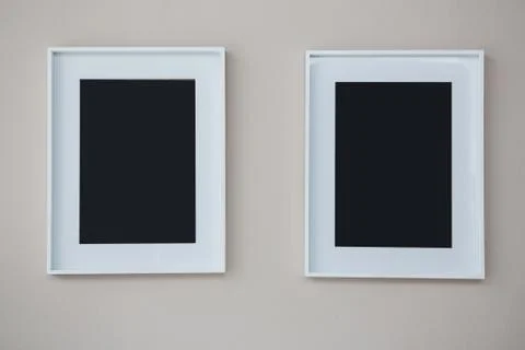 Picture frames on wall Stock Photos