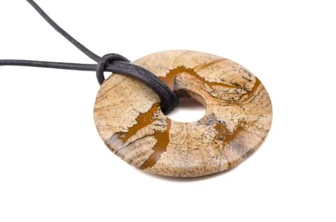 Picture jasper donut on leather string Stock Photos