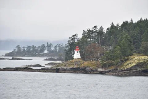 A picture of lighthouse on the point. Foto stock