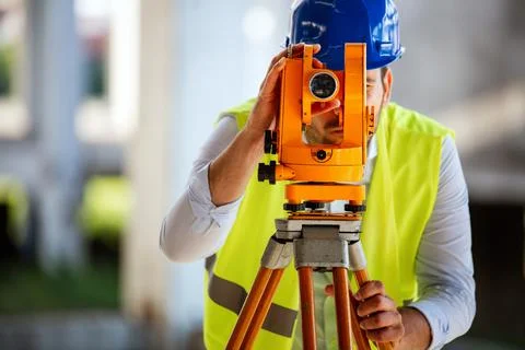 Picture of man construction engineer working on building site Фото