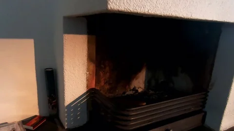 Picture of a man in the fireplace Stock Footage 104040848