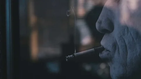 Picture of a smoking man Stock Footage 76950146