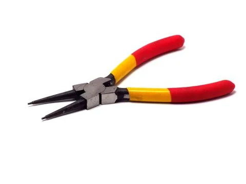 Picture of snap ring plier that has a yellow - red handle Foto stock