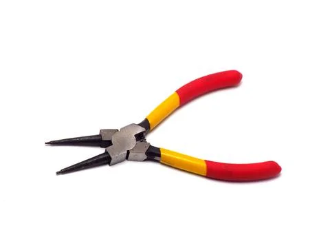 Picture of snap ring plier that has a yellow - red handle Foto stock