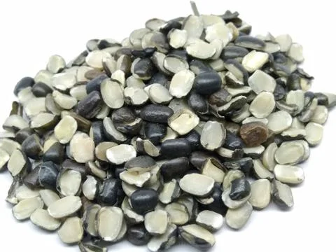 A picture of split black lentil isolated on white background Stock Photos