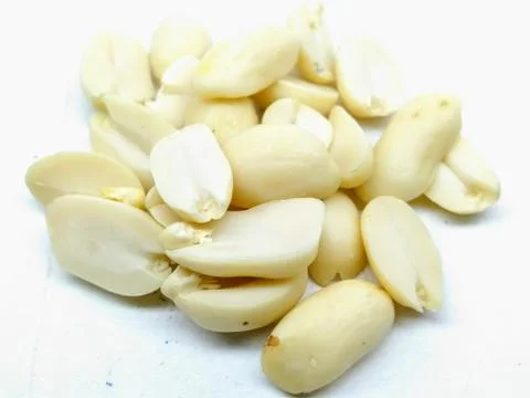 A picture of split Peanuts isolated on a white background Stock Photos