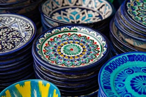 Picture stacks of traditional hand-crafted plates being sold on the doorsteps Stock Photos