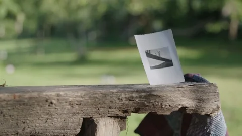 Picture stuck on old table Stockbeeldmateriaal 89343598