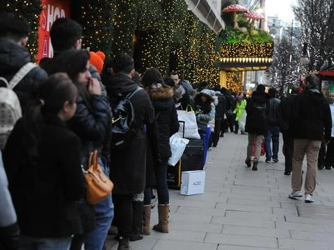 Pictured: People Queue Up Outside Selfridges For The Annual Boxing Day Sale With Stock Photos