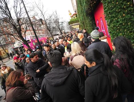 Pictured: People Queue Up Outside Selfridges For The Annual Boxing Day Sale With Stock Photos