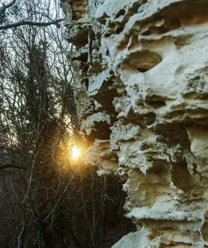 Picturesque background of collapsing surface of limestone rock. Abstract beau Stock Photos