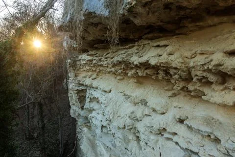 Picturesque background of collapsing surface of limestone rock. Abstract beau Stock Photos