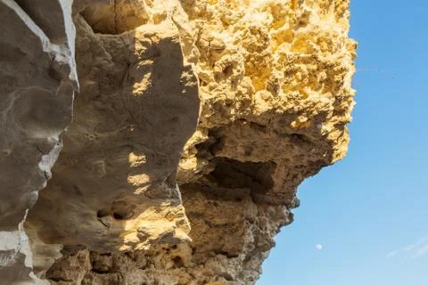 Picturesque background of collapsing surface of limestone rock. Abstract beau Stock Photos